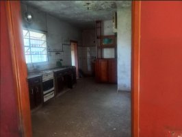 10x46 lot with 3-room house, shop and garage