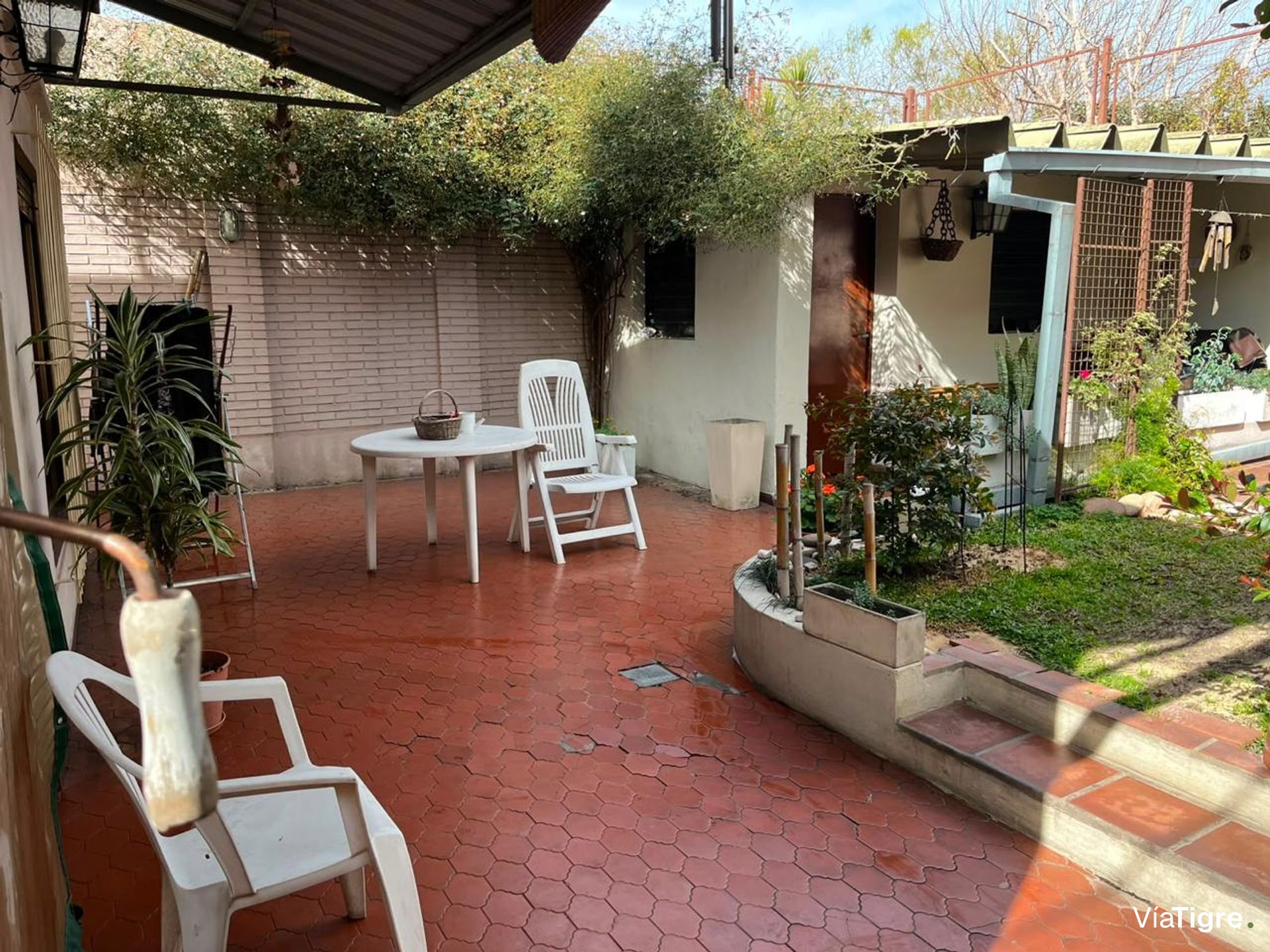 Casa con jardín