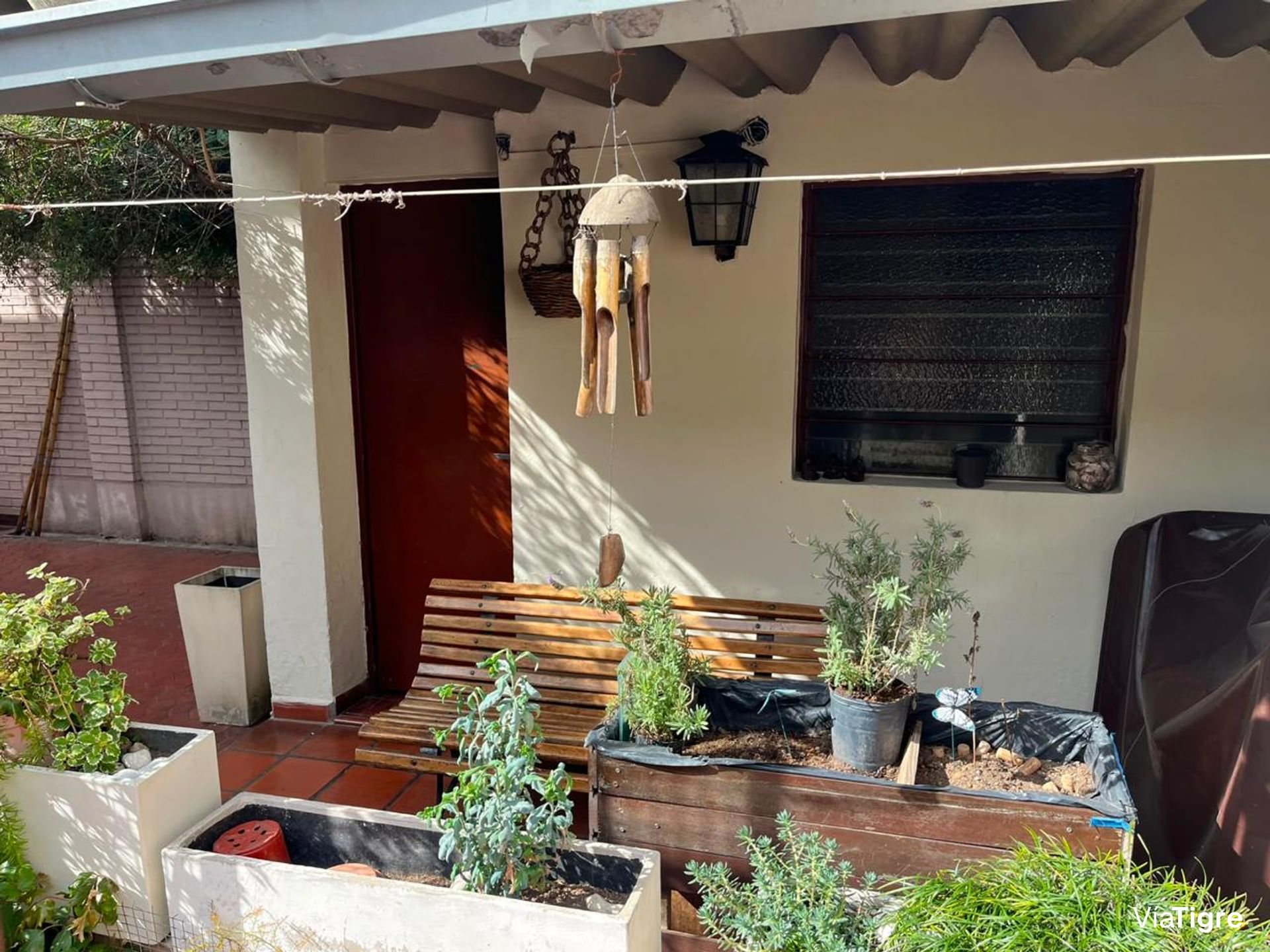Casa con jardín