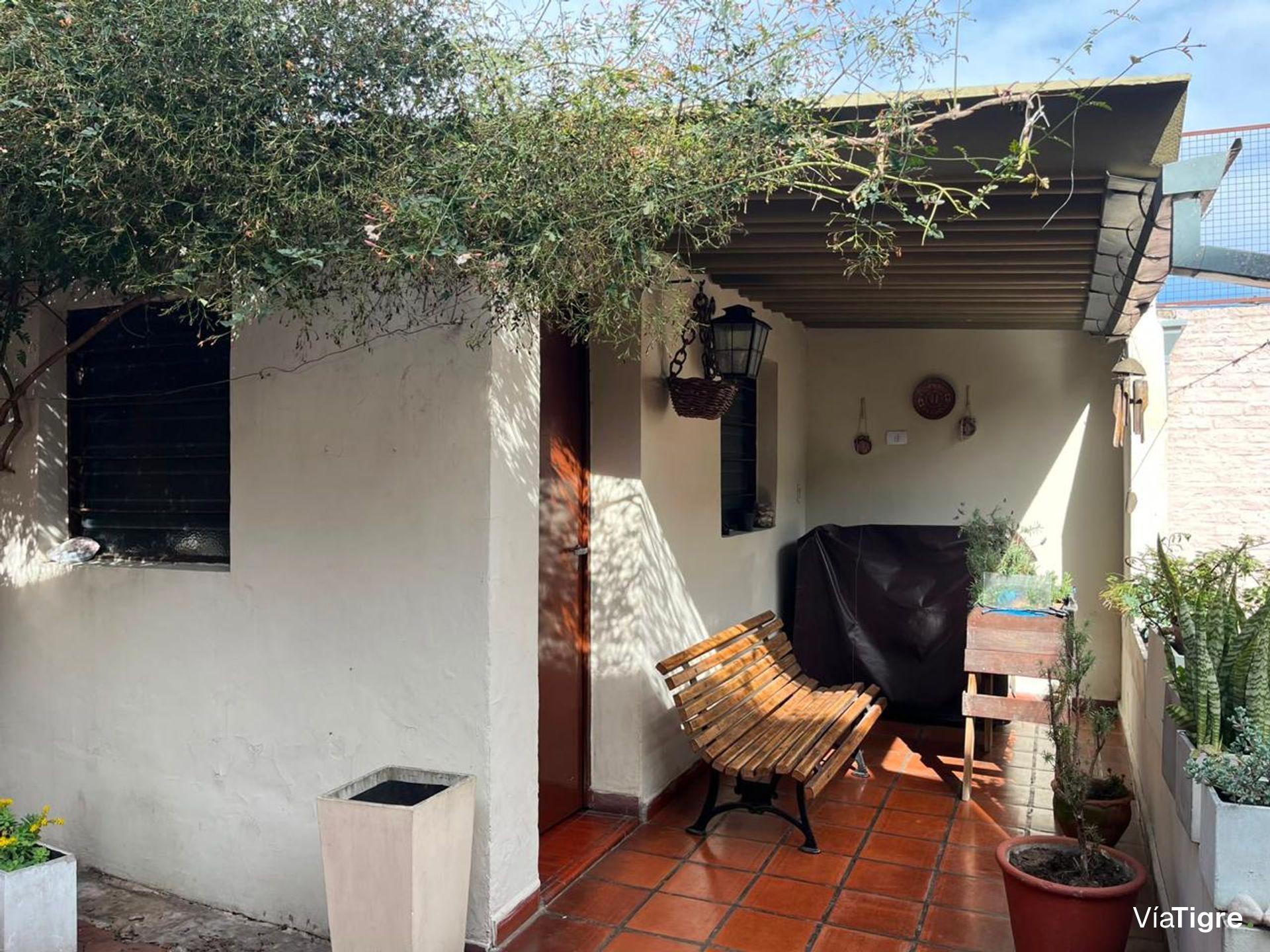 Casa con jardín