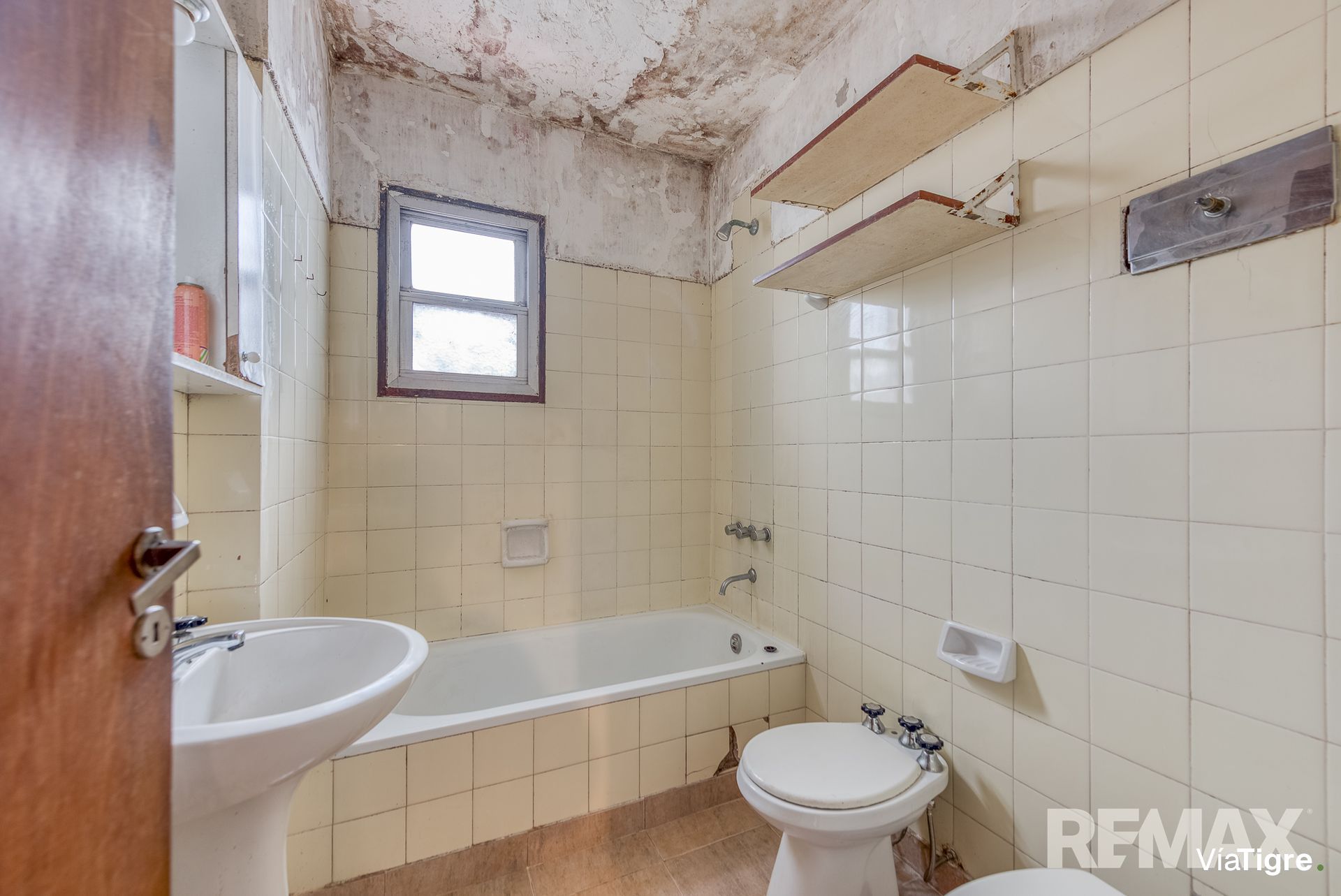 Venta depto 3 amb a refaccionar 2 balcones Tigre