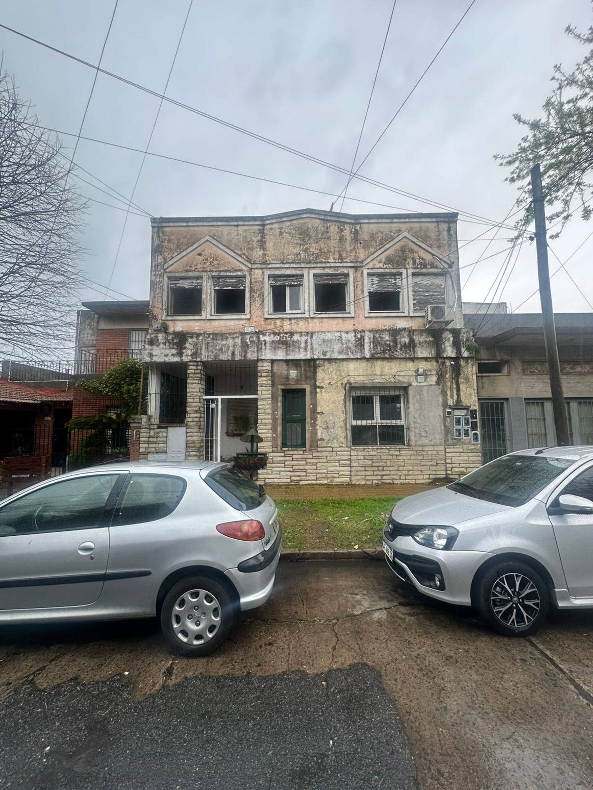 House Divided into Four Rental Apartments