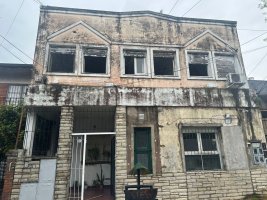 House Divided into Four Rental Apartments