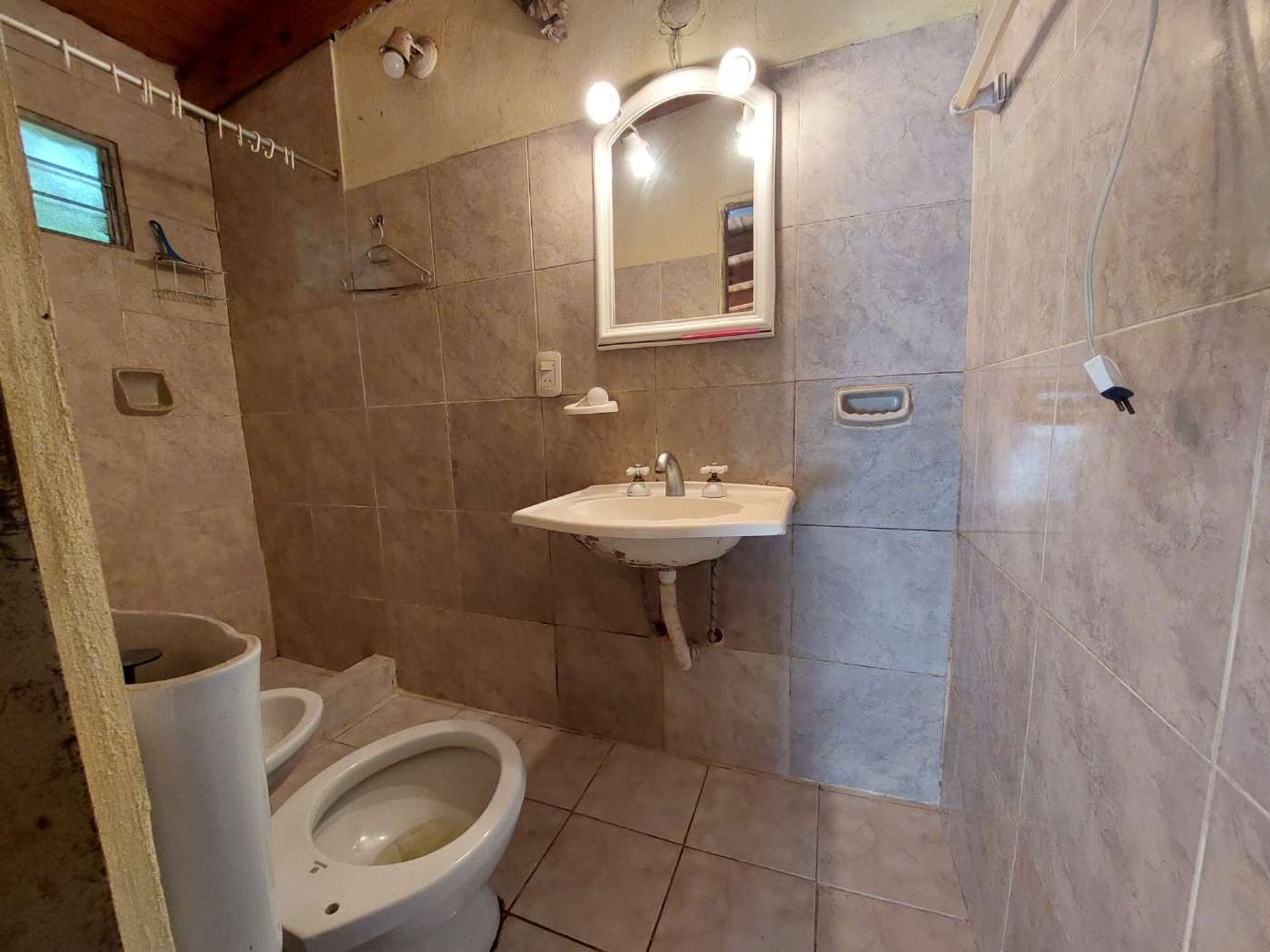 Venta casa 3 ambientes, cochera y jardín en Olivos