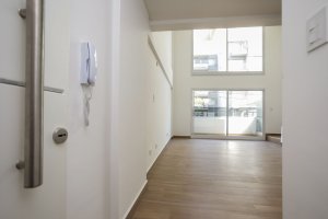 Two-room front loft with balcony, garage, and amenities