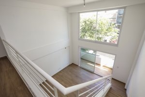 Two-room front loft with balcony, garage, and amenities