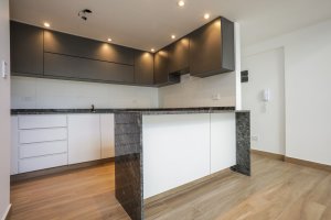 Two-room front loft with balcony, garage, and amenities