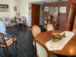 For Sale: Semi-basement 4-room Apartment with Garage and Pool