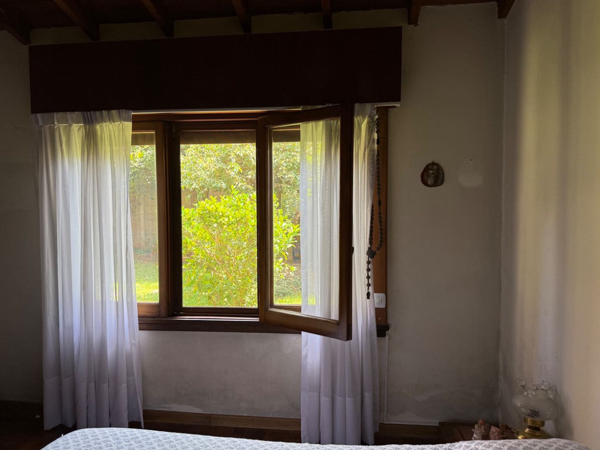 Casa de una planta con altillo y jardín Martinez