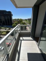 Two-room brand-new rental with garage, balcony, river view