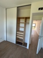 Two-room brand-new rental with garage, balcony, river view