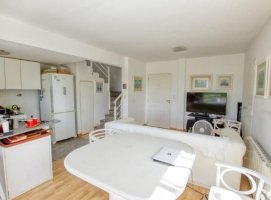 Duplex 1‑bedroom for sale with balcony grill pile