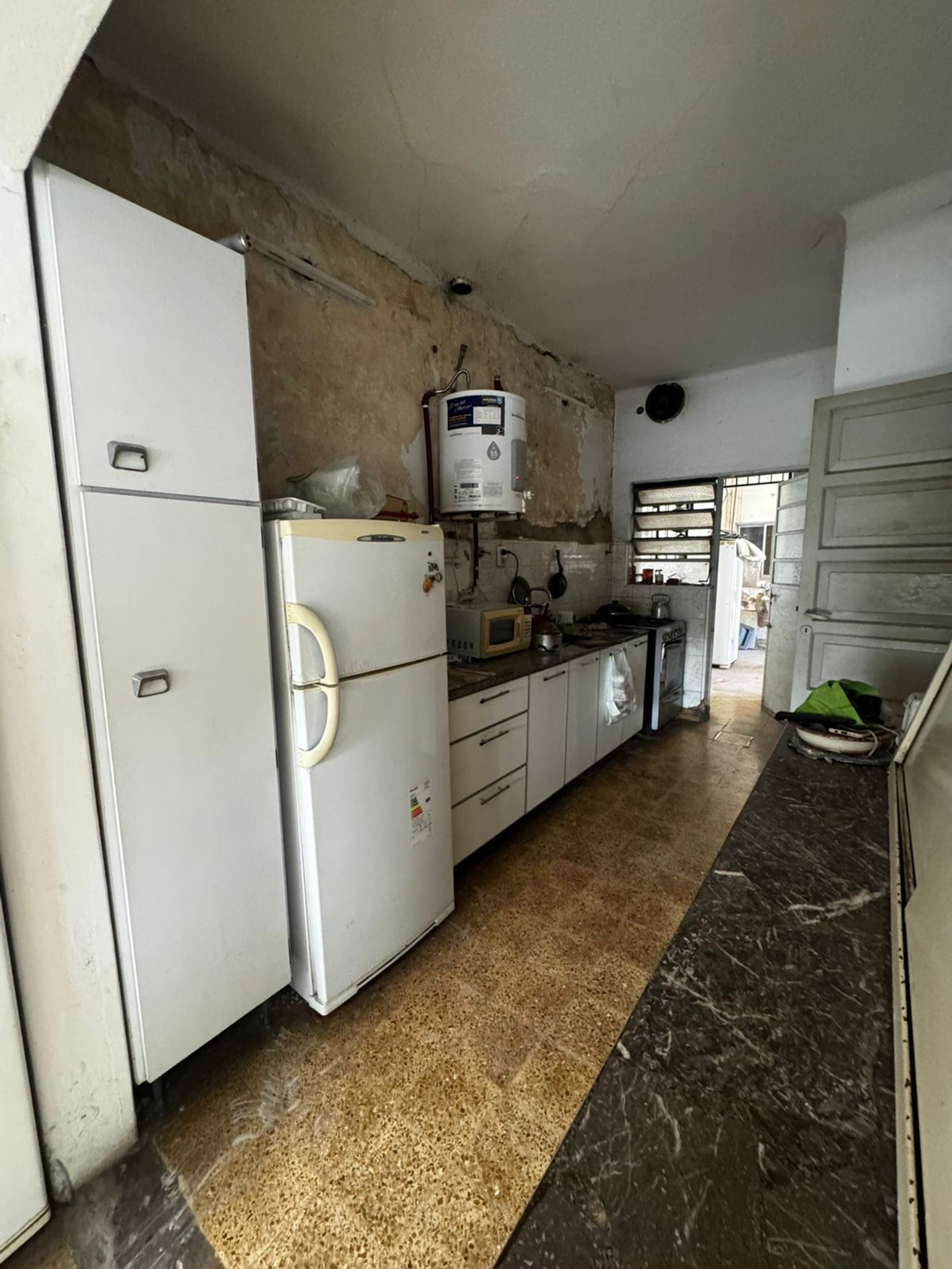 Galpón 12m frente 35m fondo con vivienda Boulogne