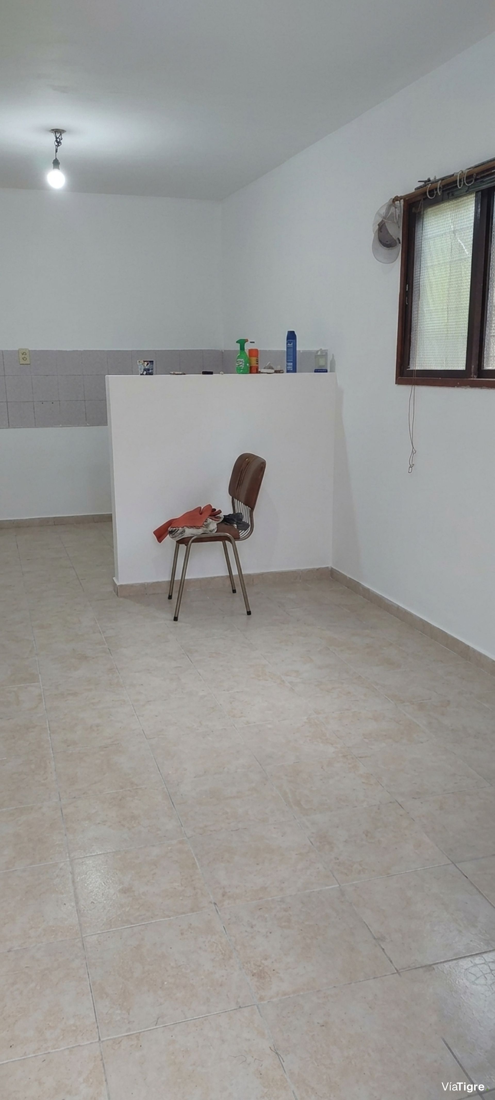 Lote con casa en venta en Benavidez para refacción