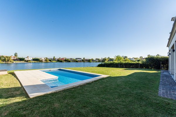 Sale House On The Lagoon In San Benito With Pool
